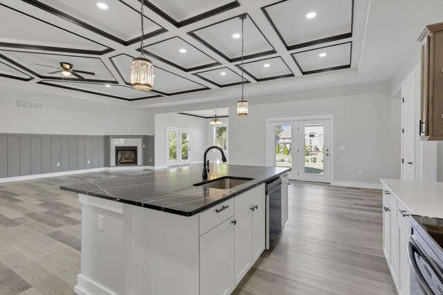 13917 Fantasy Way, Pickerington, OH 43147 - kitchen with white cabinetry, a kitchen island with sink, sink, and plenty of natural light