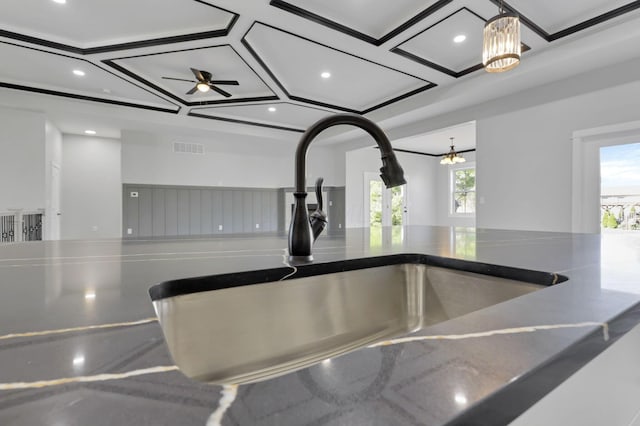 13917 Fantasy Way, Pickerington, OH 43147 - interior details with ceiling fan with notable chandelier and sink