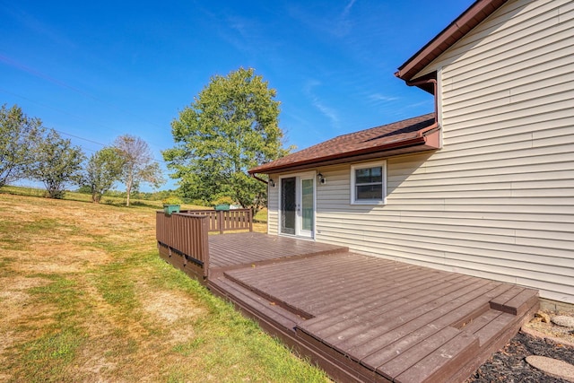 deck featuring a lawn