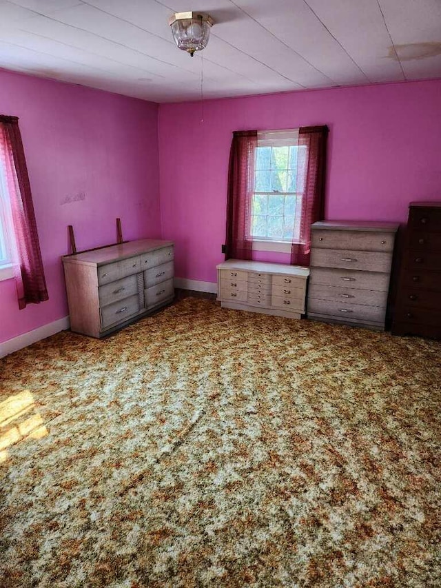 unfurnished bedroom featuring carpet flooring