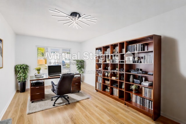 office space with light hardwood / wood-style floors