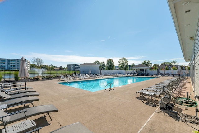 view of pool featuring a patio area