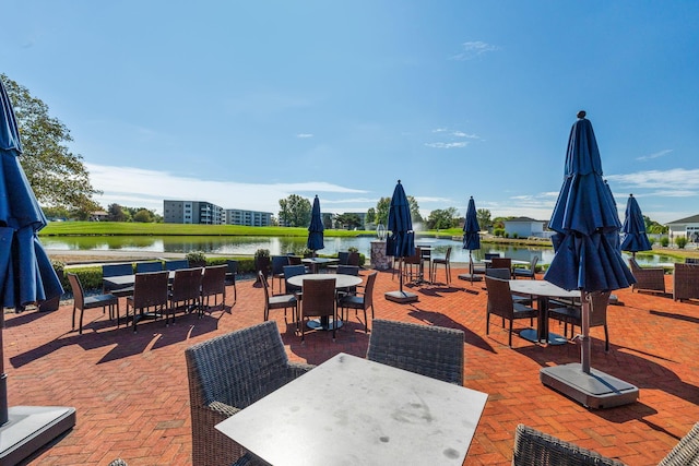 view of patio / terrace featuring a water view