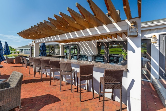 view of patio / terrace with a bar