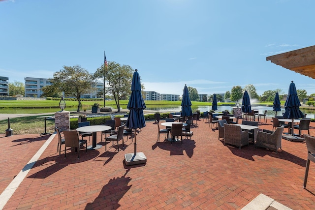 view of patio / terrace featuring a water view