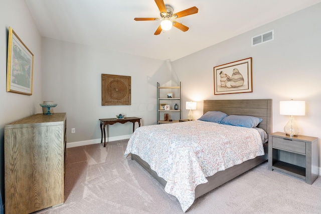 bedroom featuring ceiling fan and light colored carpet