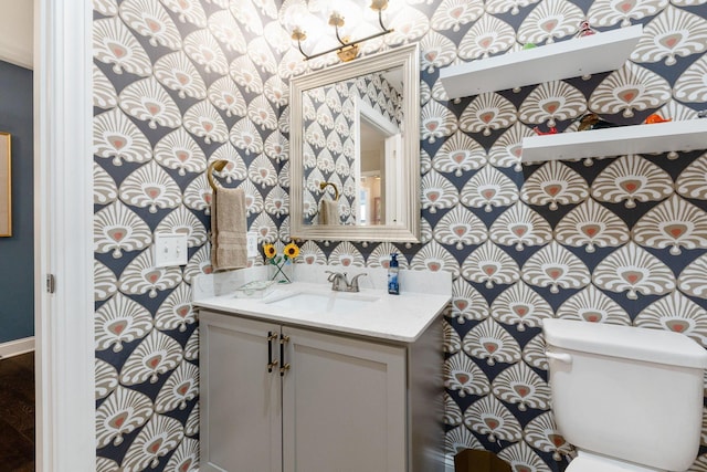 bathroom with vanity and toilet