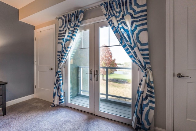 entryway featuring french doors and carpet floors