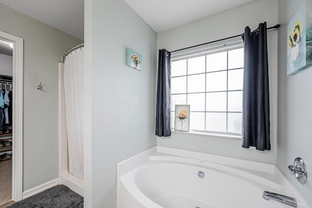 bathroom with independent shower and bath