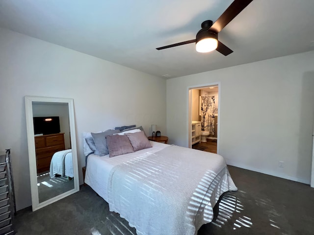 bedroom featuring ceiling fan and ensuite bathroom