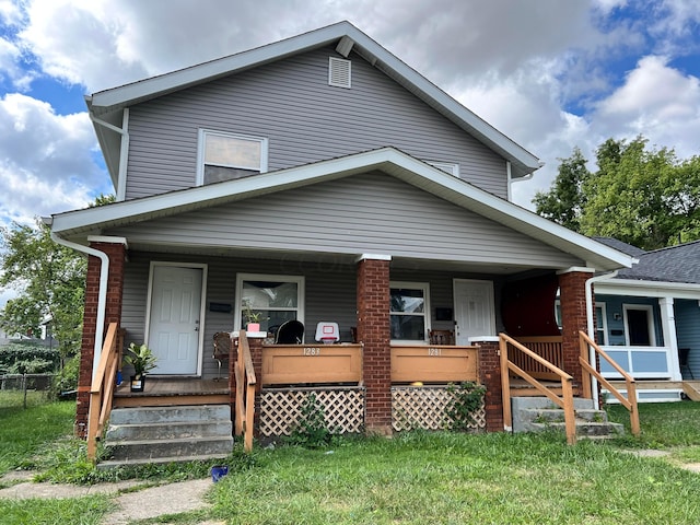 view of front of property featuring covered porch