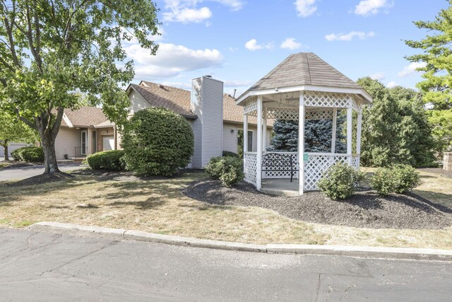 view of front of home featuring a gazebo