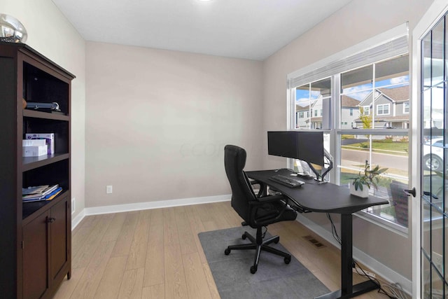 office area featuring light hardwood / wood-style flooring