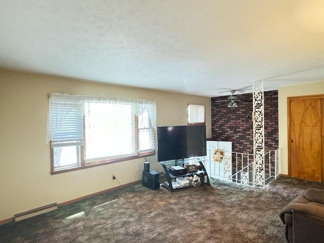 carpeted living room with a textured ceiling and a baseboard radiator