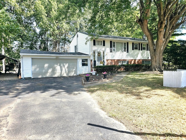 raised ranch featuring a garage