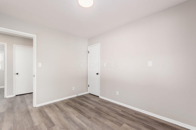 empty room featuring light hardwood / wood-style floors