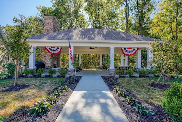 view of property's community with a yard