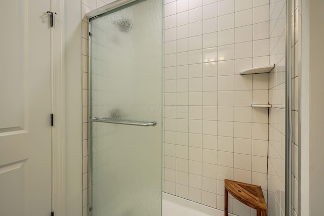 bathroom featuring an enclosed shower