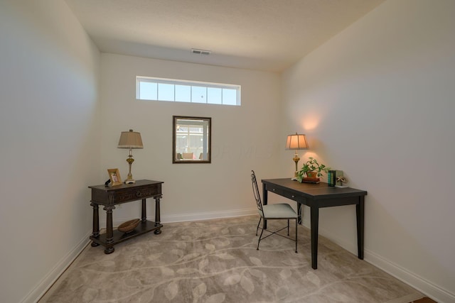 view of carpeted home office