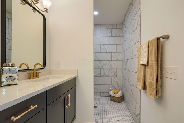 bathroom with tile patterned floors and vanity