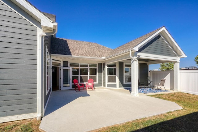 back of house with a patio