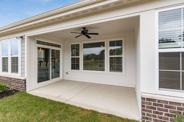 view of patio / terrace featuring ceiling fan