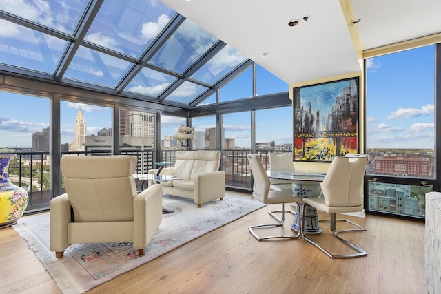 sunroom / solarium with vaulted ceiling and a wealth of natural light