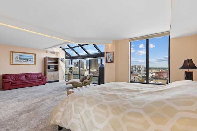 bedroom with carpet floors and access to exterior