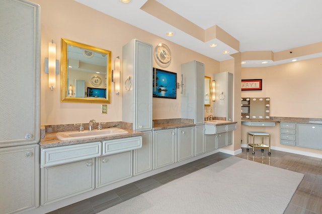 bathroom with tile patterned flooring and vanity