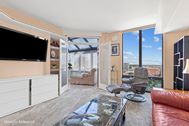 carpeted living room with floor to ceiling windows and french doors