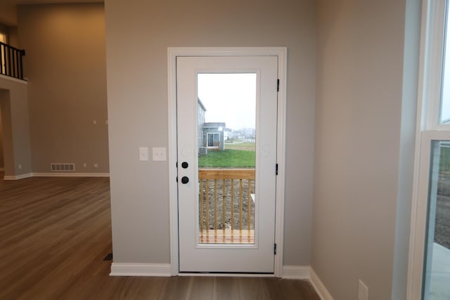 doorway featuring hardwood / wood-style flooring