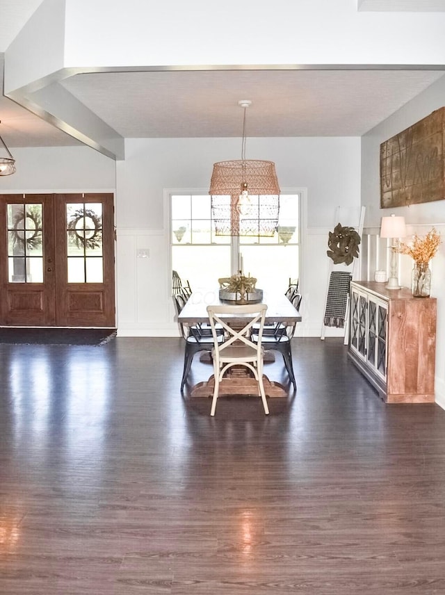 dining room featuring french doors and dark hardwood / wood-style floors