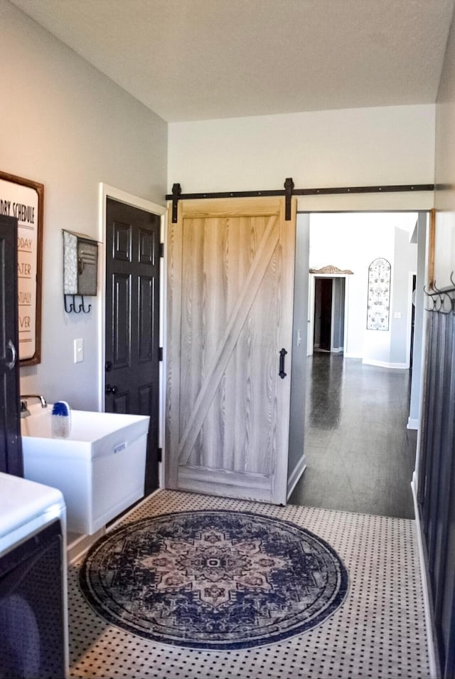 bathroom with washer / dryer and sink