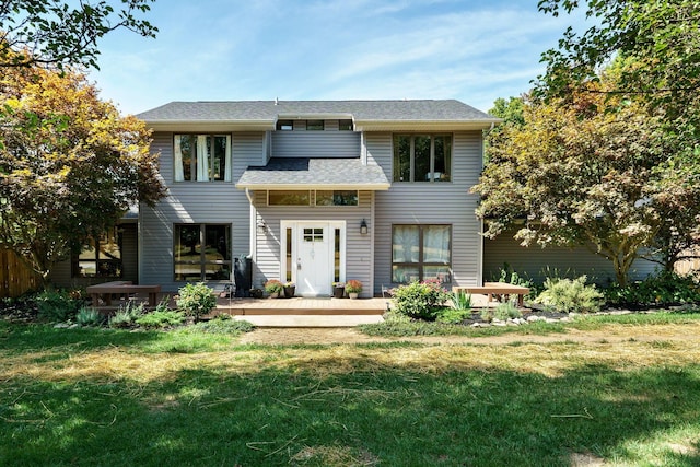 3630 Singing Wind Way, Urbana, OH 43078 - rear view of house with a lawn and a deck