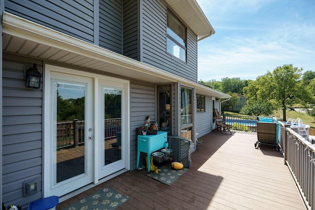 3630 Singing Wind Way, Urbana, OH 43078 - wooden deck featuring an outdoor pool