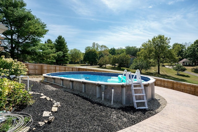 3630 Singing Wind Way, Urbana, OH 43078 - view of pool with a fenced backyard and view of scattered trees