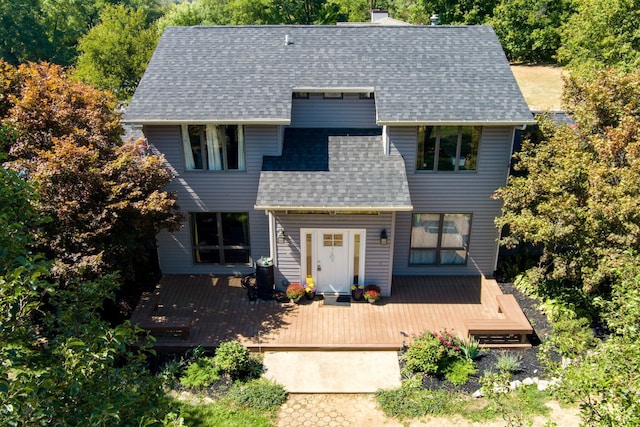3630 Singing Wind Way, Urbana, OH 43078 - view of front of home featuring roof with shingles, a wooden deck, and a chimney