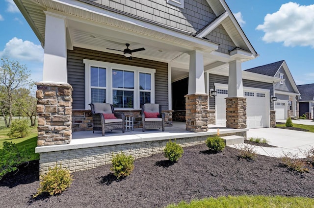 view of patio / terrace with ceiling fan, a porch, and a garage