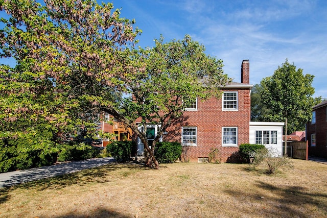 exterior space featuring a front lawn