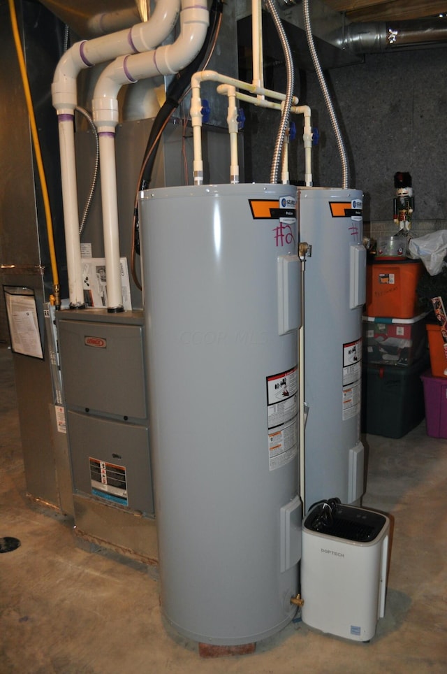 utility room with electric water heater