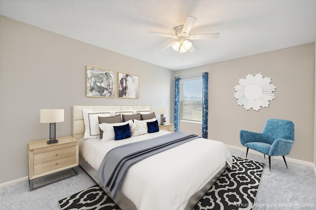 bedroom with carpet, a ceiling fan, and baseboards