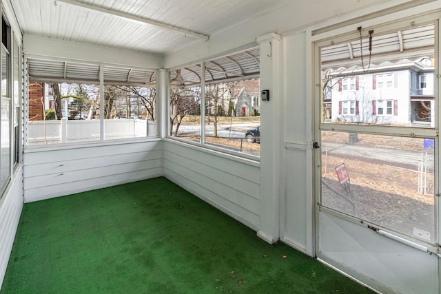 sunroom featuring plenty of natural light