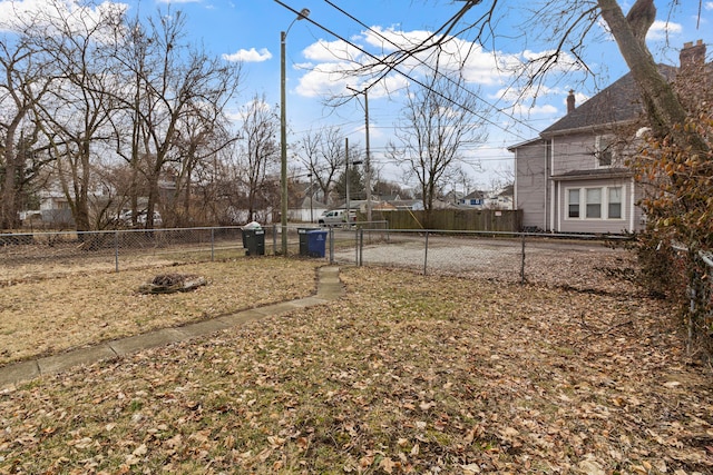 view of yard with a gate and fence