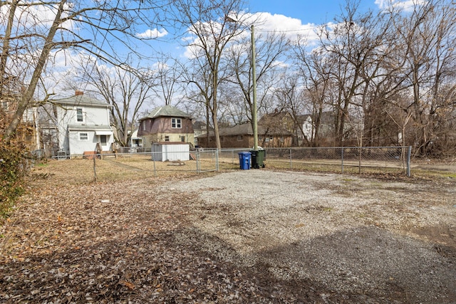 view of yard with a gate and fence