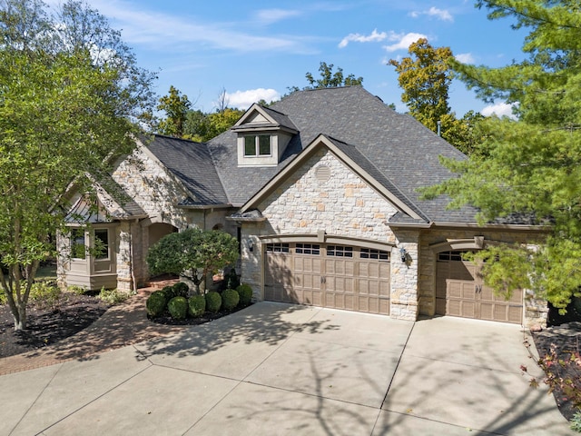 view of front of home with a garage