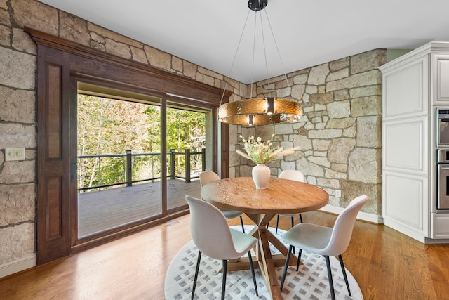 dining room featuring wood-type flooring