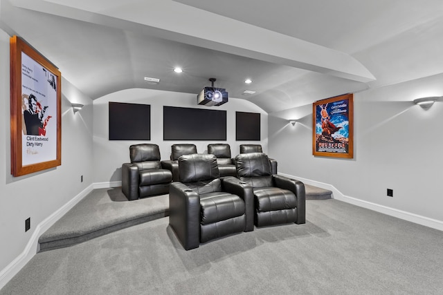 carpeted cinema featuring lofted ceiling