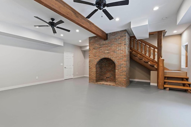 unfurnished living room featuring ceiling fan, a fireplace, beamed ceiling, and concrete flooring