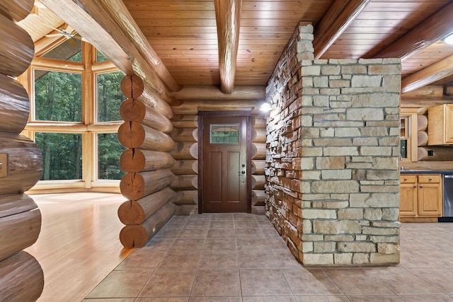 entrance foyer featuring log walls, light tile patterned floors, vaulted ceiling with beams, and wood ceiling