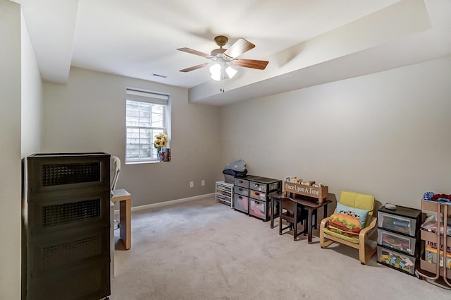 miscellaneous room with light carpet and ceiling fan